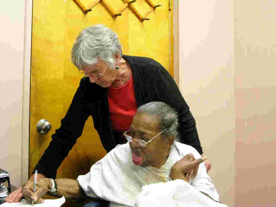Delores Smith receives help from her attorney Sue Jamieson. Delores Smith receives help from her attorney Sue Jamieson.