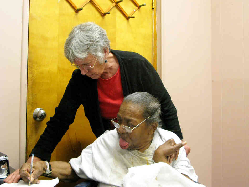 Delores Smith receives help from her attorney Sue Jamieson. Delores Smith receives help from her attorney Sue Jamieson.