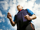 70-year-old man runs outdoors. 70-year-old man runs outdoors.