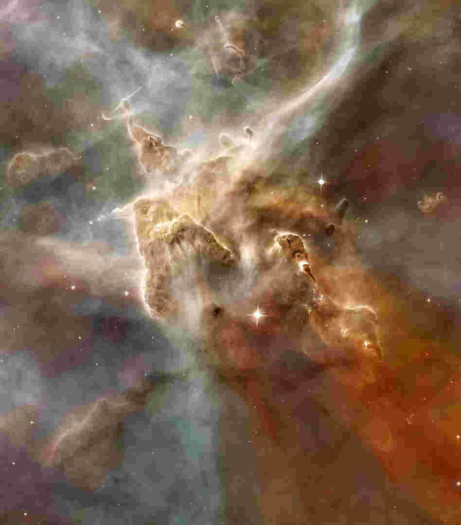 A star-forming region in the Carina Nebula. A star-forming region in the Carina Nebula.