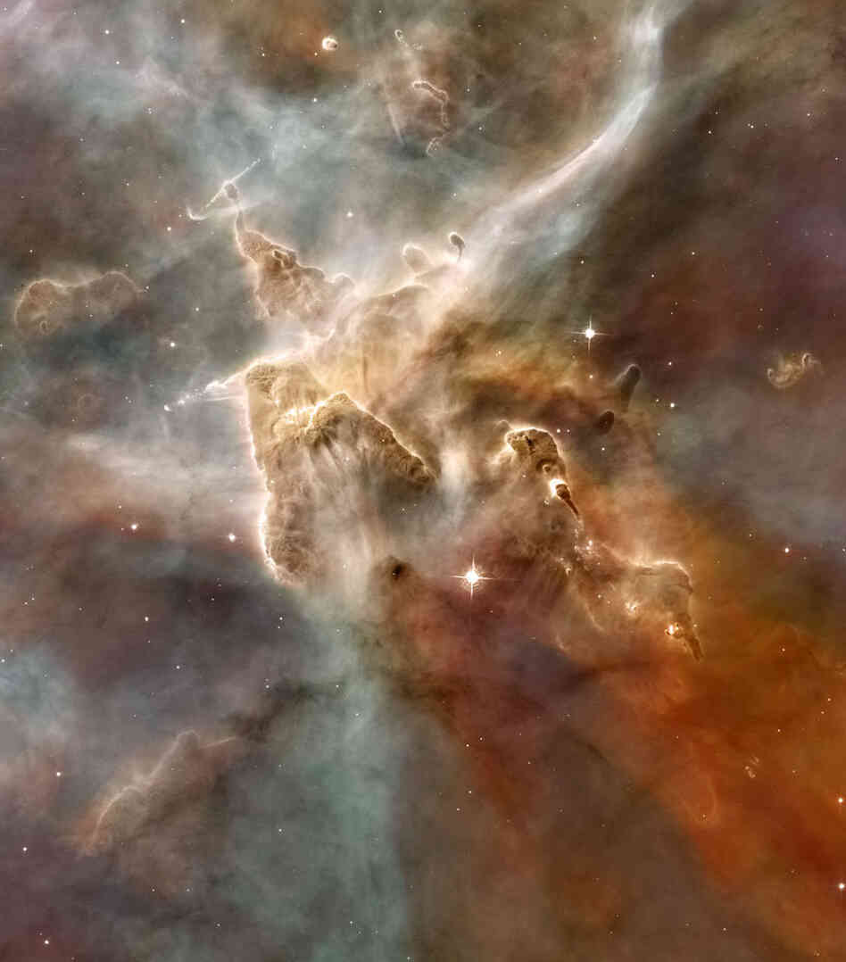 A star-forming region in the Carina Nebula. A star-forming region in the Carina Nebula.