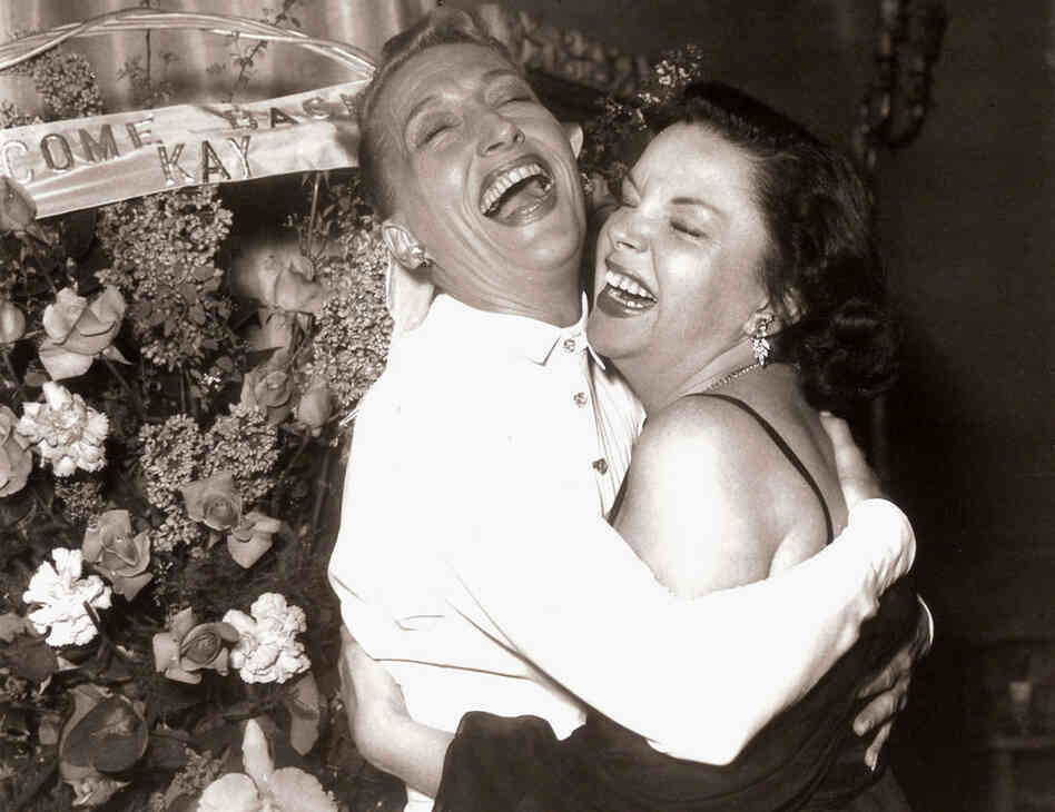 Thompson (left) with Judy Garland, backstage at Cafe de Paris in London in 1951. Thompson was Garland's vocal coach.
