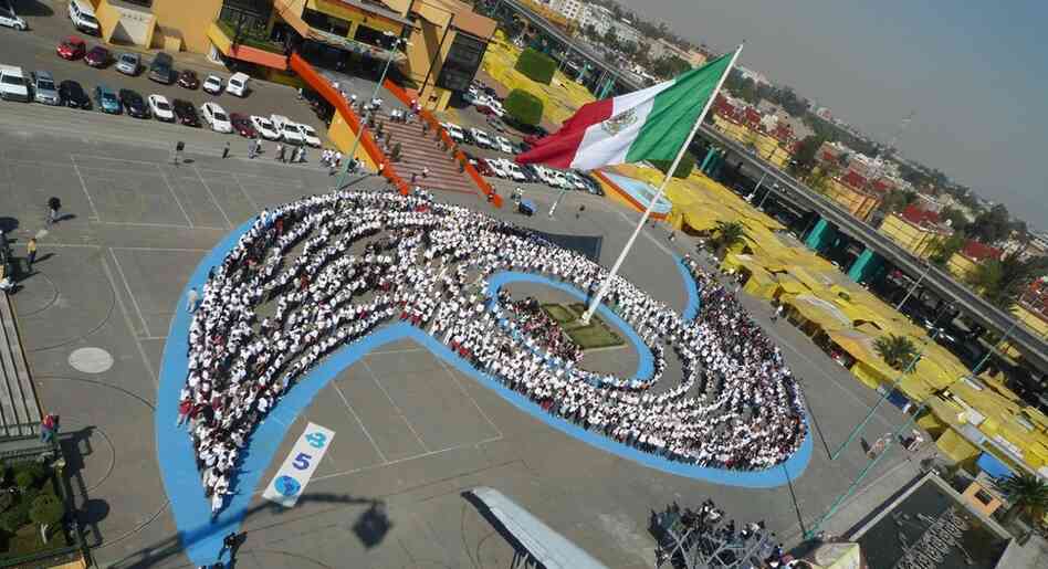 More than 3,500 schoolchildren and members of the community came together in Mexico City's Venustiano Carranza plaza to form a "human hurricane" — representing Mexico's vulnerability natural disasters such as the devastating hurricanes that hit the states of Nuevo Leon and Veracruz earlier this year. 