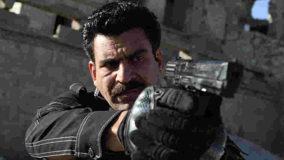 Kamran (actor Najebullah Sadiq) is the hardened but principled veteran police officer on 'Eagle Four' Kamran (actor Najebullah Sadiq) is the hardened but principled veteran police officer on 'Eagle Four'