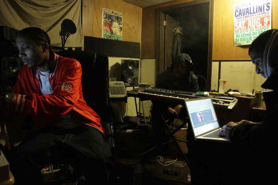(From left) DJ Spinn, DJ Rashad, and Gant-Man work on a track at their studio "The Tracks Factory".