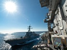 The USS John McCain (L) pulls alongside the USS George Washington in the Sea of Japan; Dec. 6. The USS John McCain (L) pulls alongside the USS George Washington in the Sea of Japan; Dec. 6.