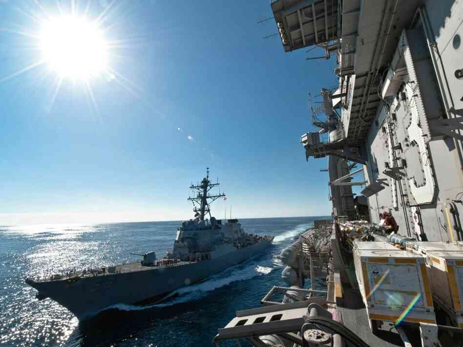 The USS John McCain (L) pulls alongside the USS George Washington in the Sea of Japan; Dec. 6. The USS John McCain (L) pulls alongside the USS George Washington in the Sea of Japan; Dec. 6.