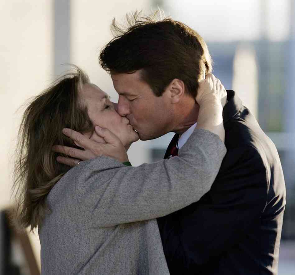 John and Elizabeth met as law students at the University of North Carolina at Chapel Hill. Here, John kisses her good-bye as she departs for a fund-raiser for the South Carolina Democratic Party in Columbia, S.C. in 2007. 