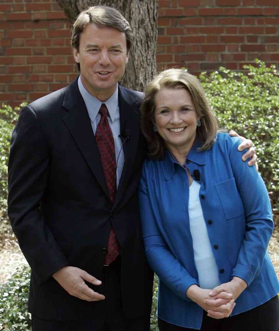 Democratic presidential hopeful John Edwards hugs his wife Elizabeth while they speak about her recurrence of cancer during a news conference in Chapel Hill, N.C., in March 2007. 