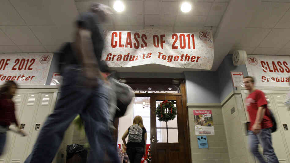 Students walk past a banner between classes at Richmond High School in Richmond, Ind., on Nov. 29. Students walk past a banner between classes at Richmond High School in Richmond, Ind., on Nov. 29.
