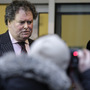 Mark Stephens, lawyer for WikiLeaks founder Julian Assange, talks to the media as he leaves a court 