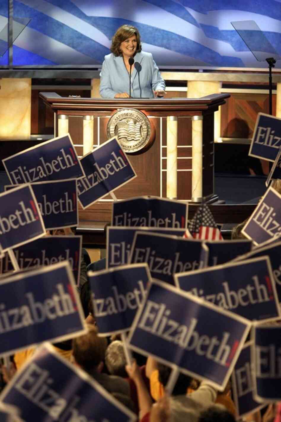 Throughout her life, Edwards wrote publicly about her struggles, including the death of her teenage son, and her failed marriage to Sen. John Edwards. Here, she is greeted by the Democratic National Convention in Boston, in July 2004. 