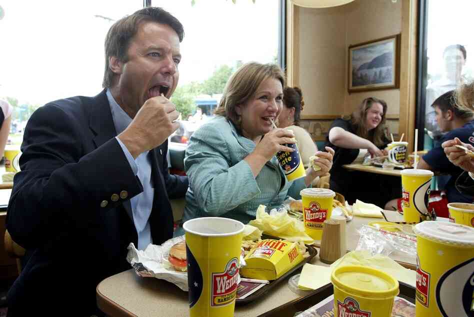 Edwards shares a 27th anniversary lunch with her husband John at a Wendy's restaurant in Newburgh, NY, during the 2004 "Believe in America" bus and train tour. Each year, the couple returned to Wendy's on their anniversary to remember their early days together. 