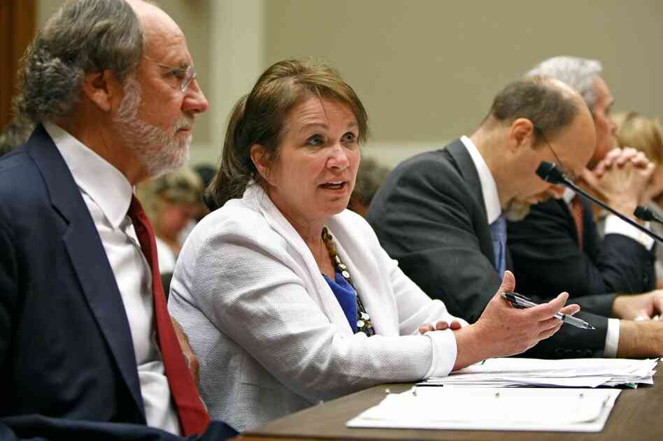 New Jersey Gov. Jon Corzine and Edwards talk before testifying in Washington, D.C., about health care reform, Sept. 18, 2008. 