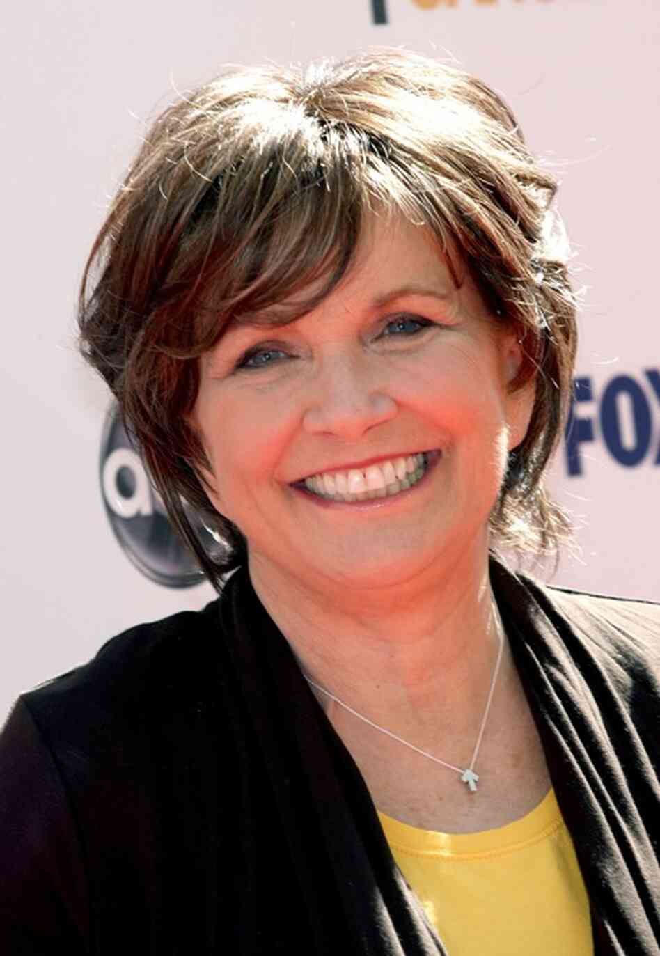 Edwards spoke openly about having cancer, and after her husband confessed to an affair, she went on the talk-show circuit. Here she arrives at the Stand Up To Cancer event held at Sony Pictures Studios on Sept. 10 in Culver City, Calif. 