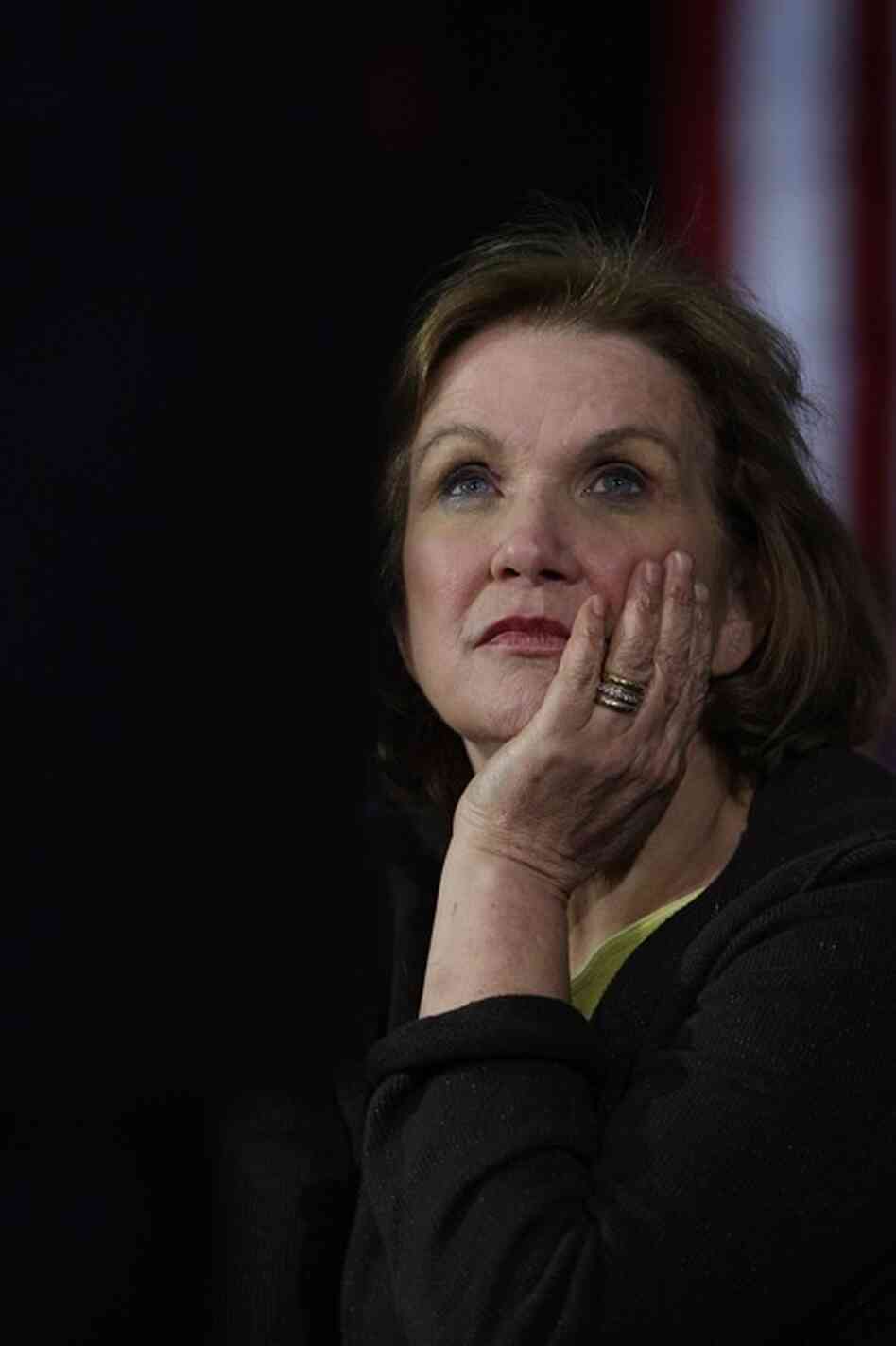 "Resilience is accepting your new reality, even if it's less good than the one you had before," said Edwards. Here, she watches her husband speak to voters at a town hall style meeting in Davenport, Iowa, in December 2007. 