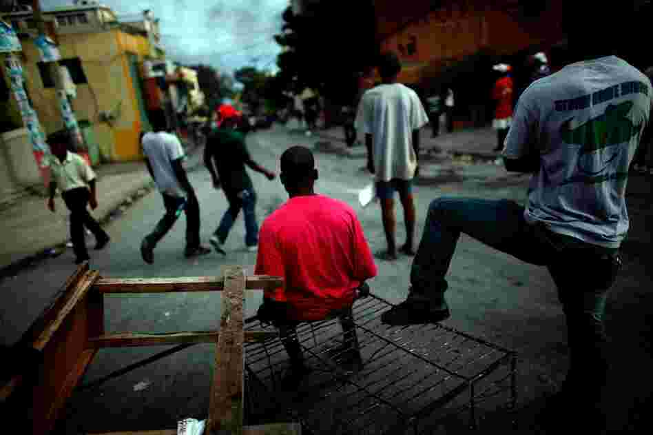 Protesters block the streets in Petionville on Wednesday. Martelly supporters claim that the Nov. 28 ballot was rigged to push the unpopular Celestin into the runoff election.
