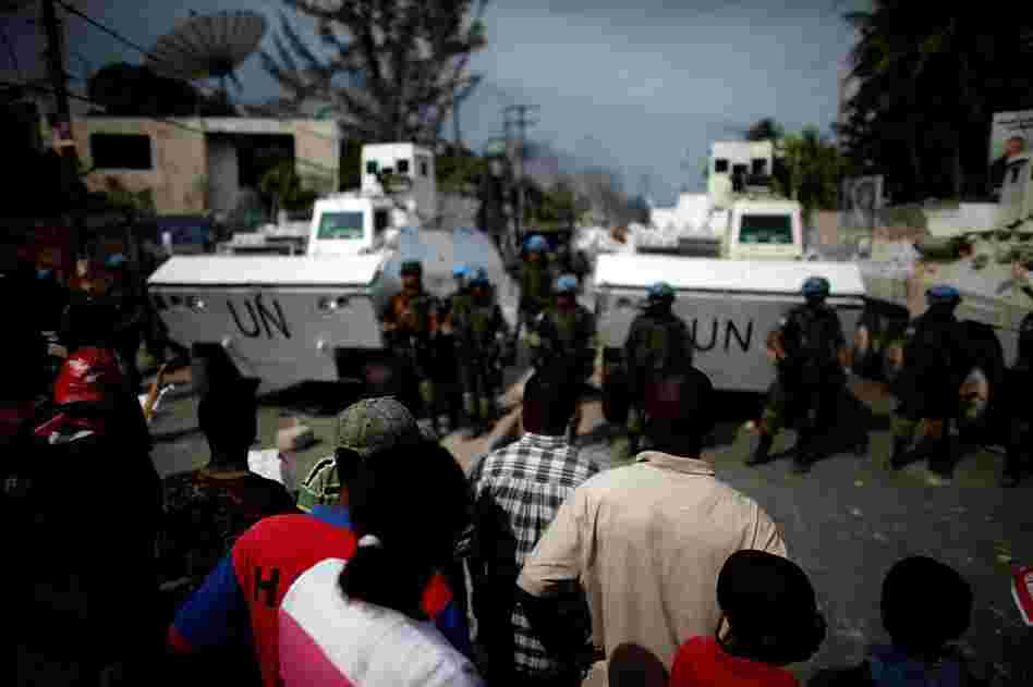 Martelly supporters confront Brazilian U.N. soldiers in Port-au Prince.