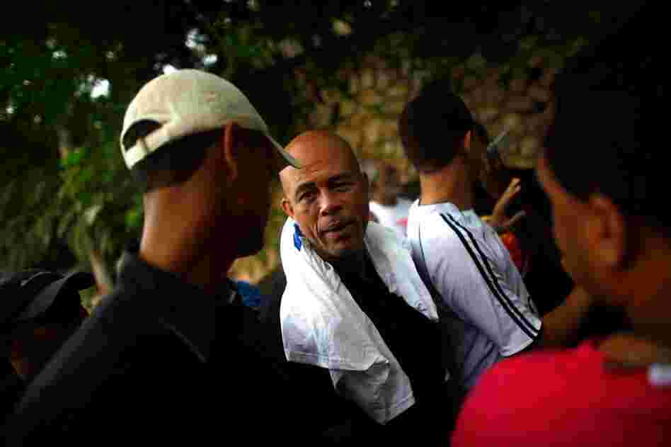 Michel "Sweet Mickey" Martelly greets his supporters at his home in Petionville.  A popular singer in Haiti, Martelly failed to qualify for the runoff, placing third after Manigat and Celestin.
