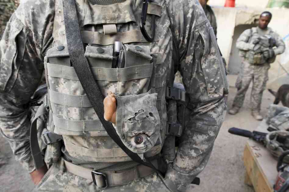 Pvt. 1st Class Edwin Laplaunt carries a "lucky doll's foot" in Afghanistan Pvt. 1st Class Edwin Laplaunt carries a "lucky doll's foot" in Afghanistan