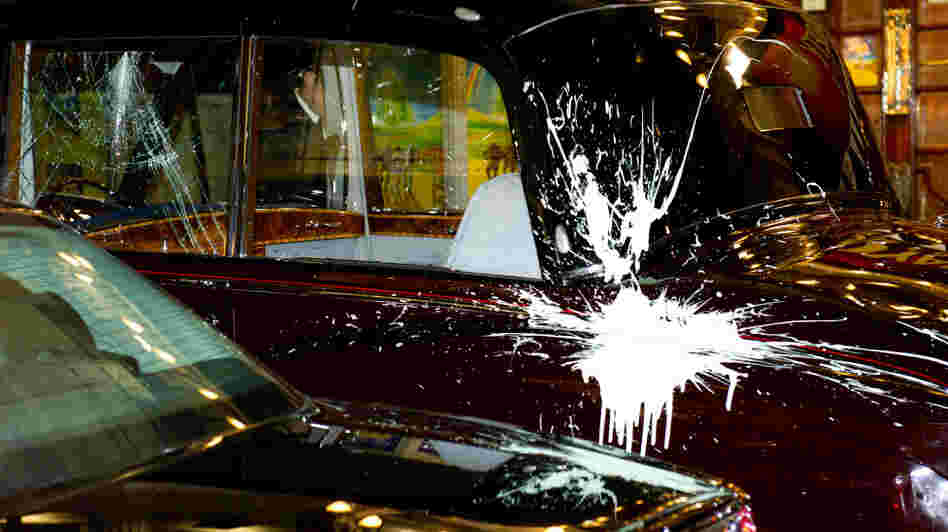 Prince Charles and Camilla's car after the attack. Prince Charles and Camilla's car after the attack.