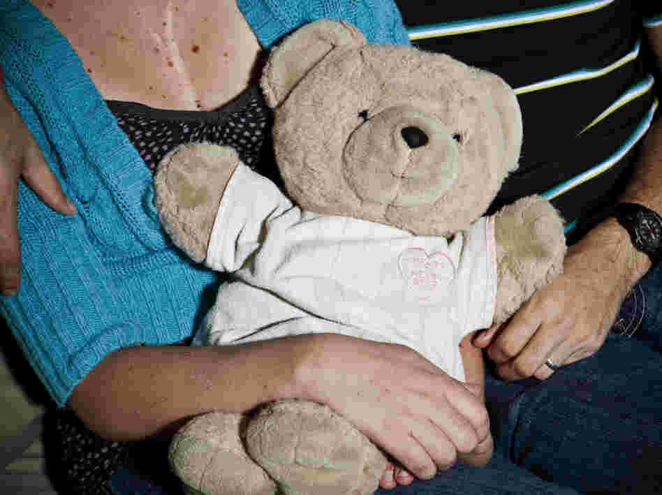 Jeni Busta holds her "Heart Bear," which she was given when she was born. 