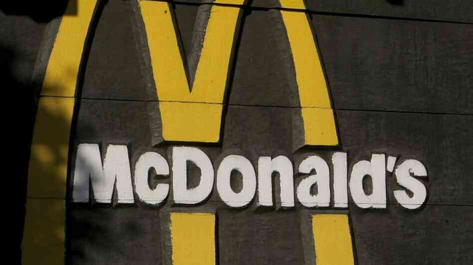 A McDonald's sign. A McDonald's sign.