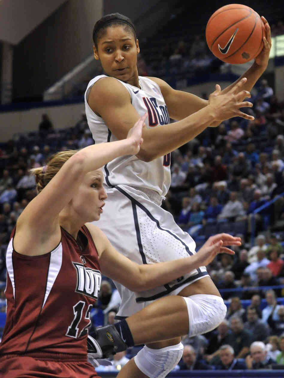 Connecticut Husky Maya Moore has led her team to new heights in college basketball. Connecticut Husky Maya Moore has led her team to new heights in college basketball.