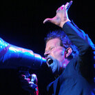 Tom Waits onstage in 2004, six years into his eligibility for induction into the Rock and Roll Hall of Fame. 