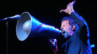Tom Waits onstage in 2004, six years into his eligibility for induction into the Rock and Roll Hall of Fame. Tom Waits onstage in 2004, six years into his eligibility for induction into the Rock and Roll Hall of Fame.