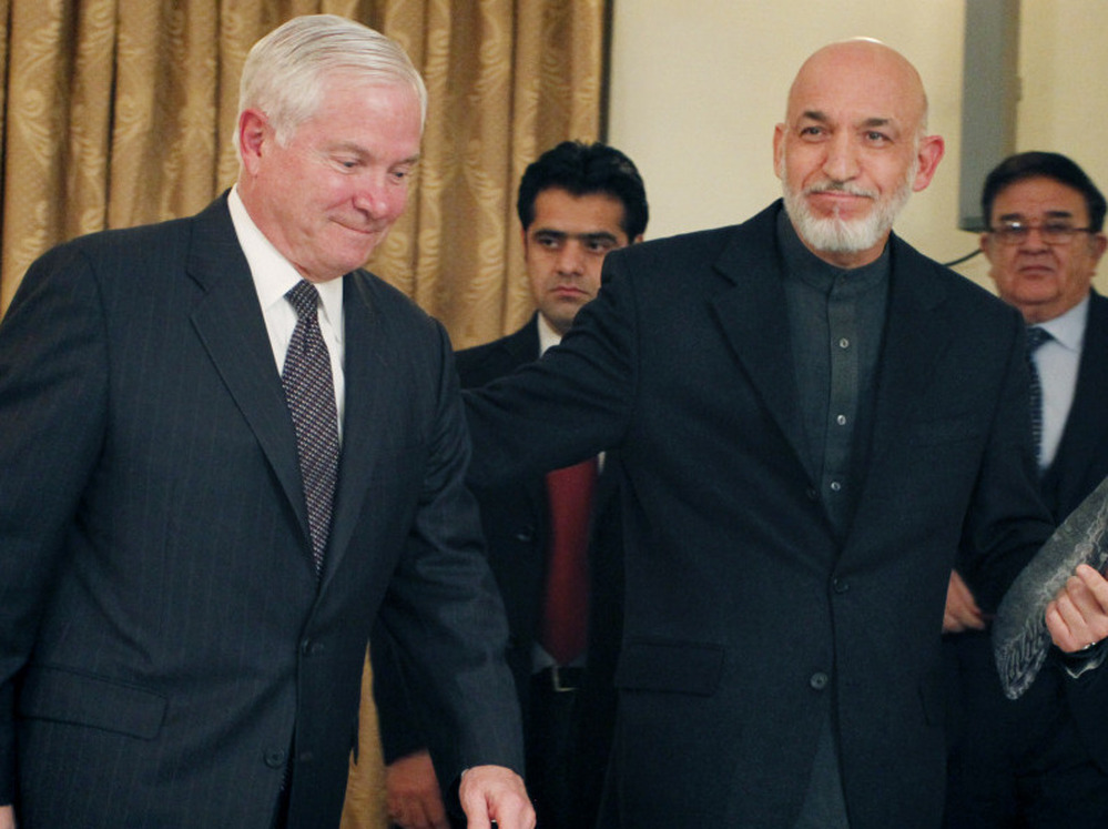 Defense Secretary Robert Gates (left) and Afghan President Hamid Karzai this month in Kabul.