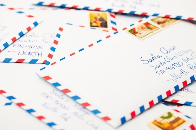 Envelopes addressed to Santa in the North Pole.