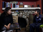 Yolanda Hilario and her teenage son Noel sit on the sofa in their home in South Central Los Angeles on Dec. 15. Yolanda Hilario and her teenage son Noel sit on the sofa in their home in South Central Los Angeles on Dec. 15.