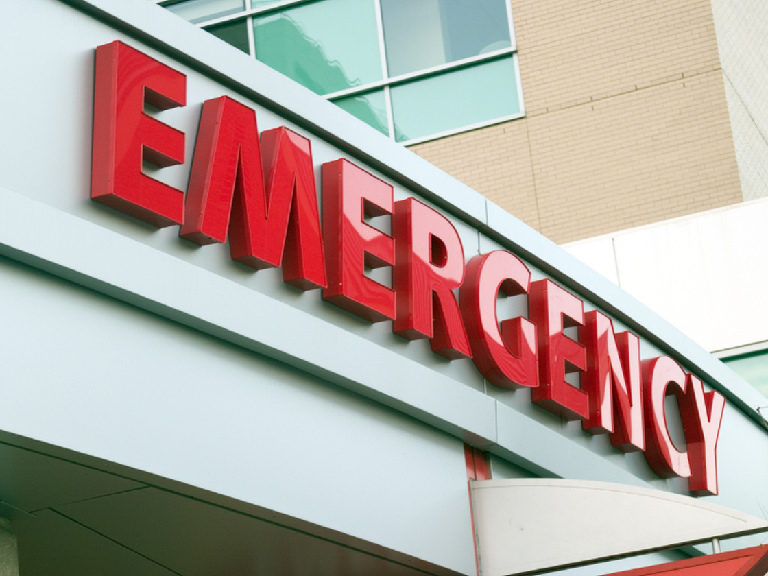 A sign for a hospital emergency room.