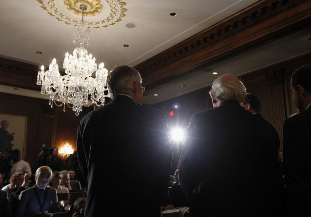 Senate Majority Leader Sen. Harry Reid (D-NV), left, stands with Sen. Carl Levin (D-MI), during a news conference about the measure to repeal "don't ask, don't tell" on an unusual Saturday session on Capitol Hill. 