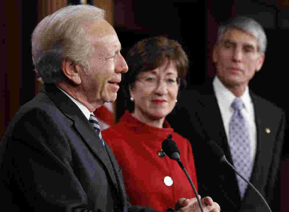 Sen. Joseph Lieberman (I-CT) left, with Sen. Susan Collins (R-ME) and Sen. Mark Udall (D-CO), talks about the passage of a bill to repeal "don't ask, don't tell" at the Capitol on Saturday. 