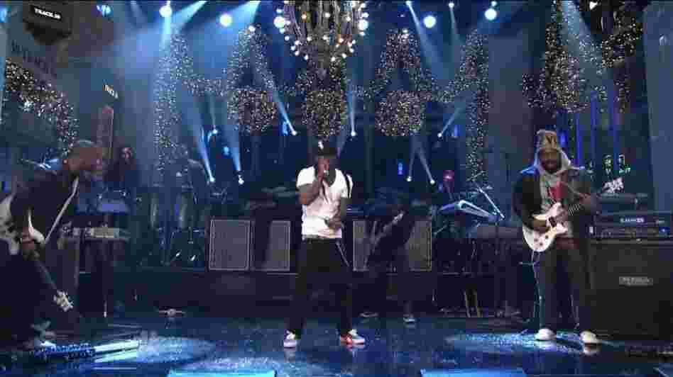 Lil Wayne performing the song "6'7'" on stage at "Saturday Night Live" just days after it was released on iTunes. Lil Wayne performing the song "6'7'" on stage at "Saturday Night Live" just days after it was released on iTunes.