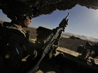 October 2009 file photo: U.S. Army Specialist Damyon Miller from the 3rd Platoon, Charlie Company, 1st Infantry Regiment, 5th Stryker Brigade Combat Team, 2nd Infantry Division, mans a machine gun mounted at the back of a Stryker vehicle as the large armored convoy patrols near the Afghanistan and Pakistan border. October 2009 file photo: U.S. Army Specialist Damyon Miller from the 3rd Platoon, Charlie Company, 1st Infantry Regiment, 5th Stryker Brigade Combat Team, 2nd Infantry Division, mans a machine gun mounted at the back of a Stryker vehicle as the large armored convoy patrols near the Afghanistan and Pakistan border.