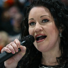 Canadian singer Holly Cole, seen here singing her country's national anthem, performed on Mountain Stage. Canadian singer Holly Cole, seen here singing her country's national anthem, performed on Mountain Stage.