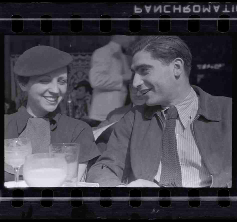 Gerda Taro and Robert Capa on the terrace of Cafe du Dome in Montparnasse, Paris, early 1936 