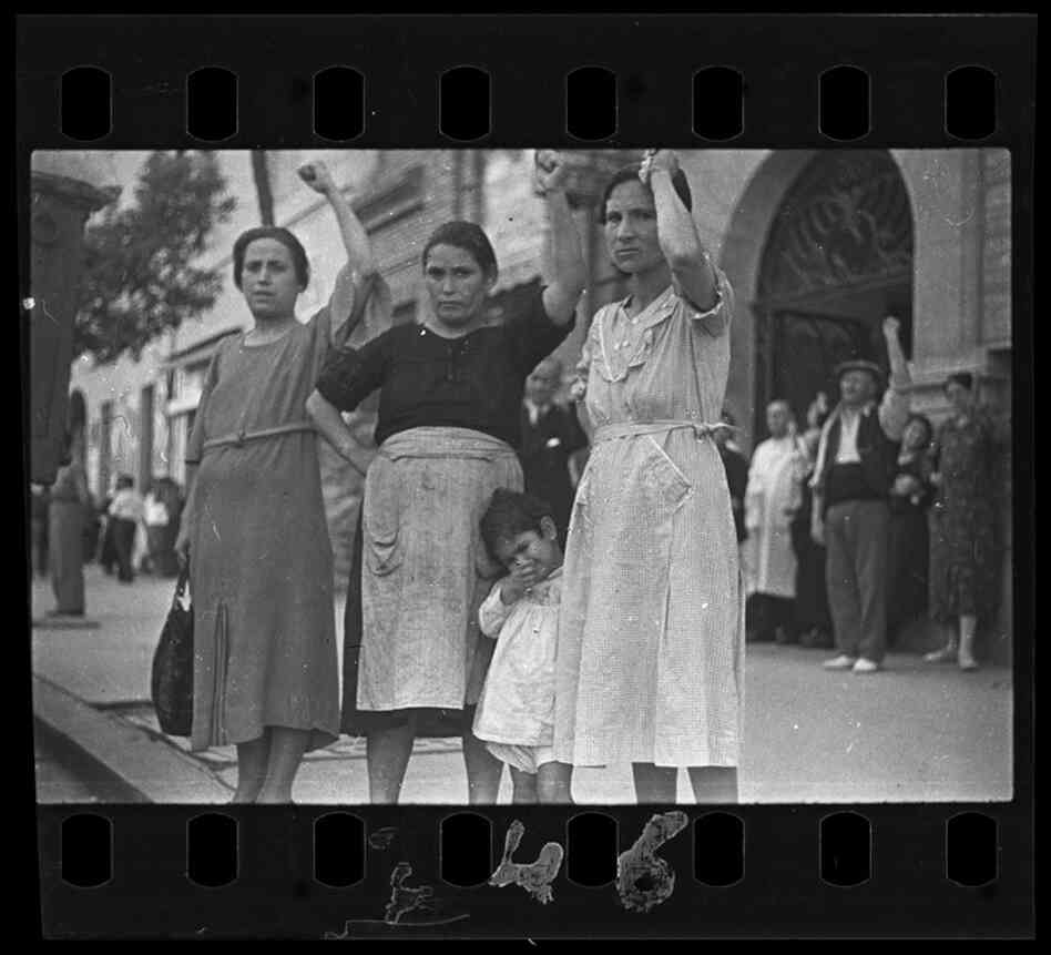 Spectators at the funeral parade of General Lukacs, Valencia, June 16, 1937 
