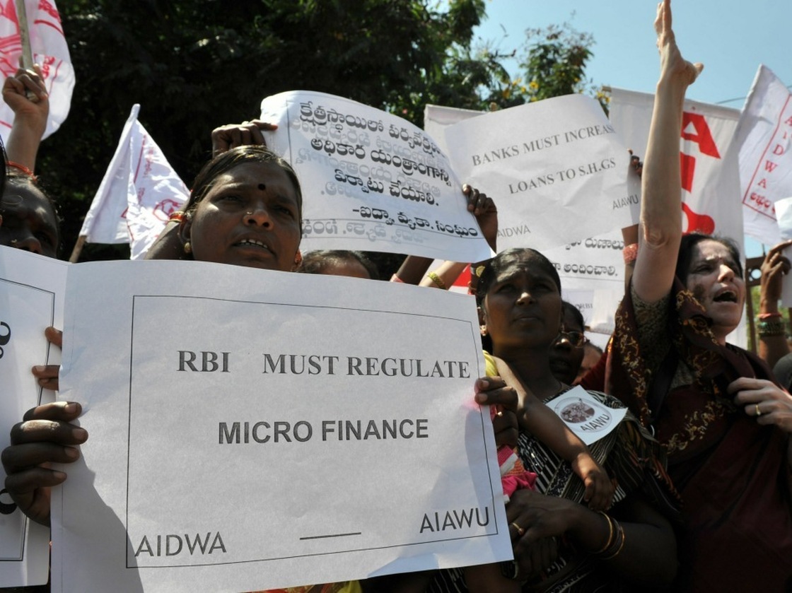 Activists of The All-India Democratic Women's Association protest Dec. 14 in front of the Reserve Bank of India, India's central banker, against microfinance institutions.