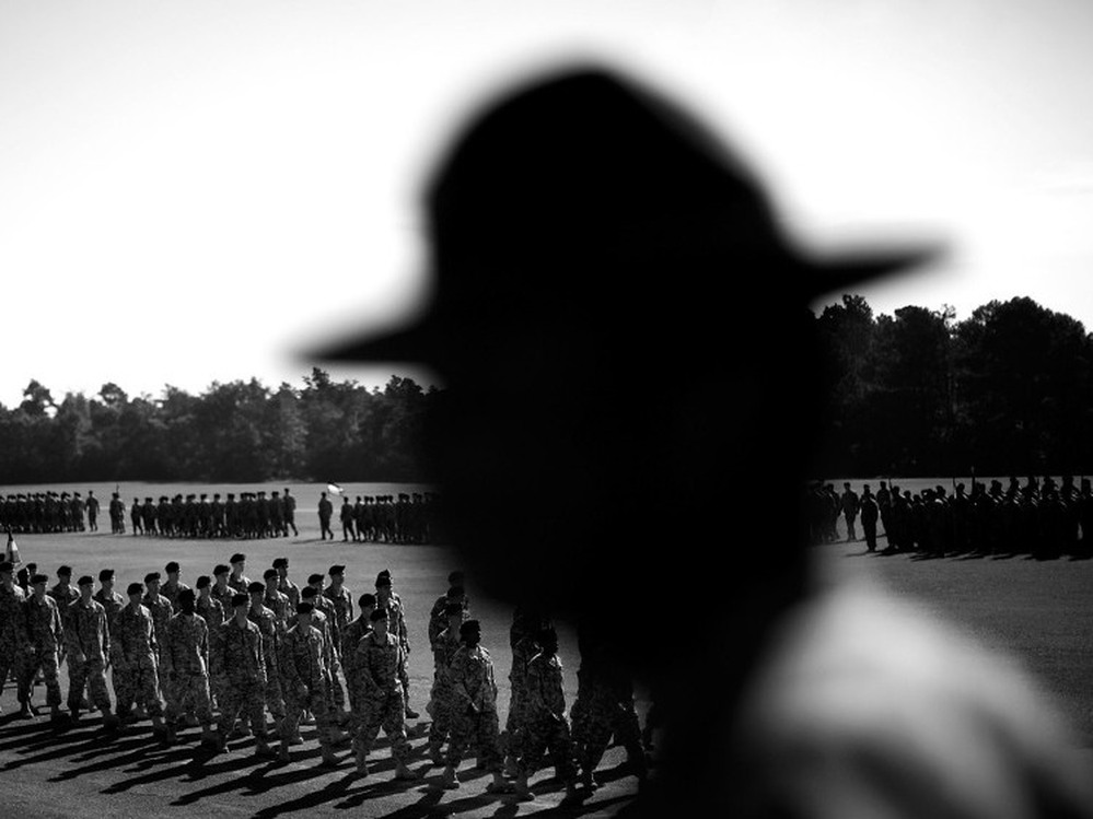 A drill seargent watches the graduation ceremony for the completion of basic training at Fort Jackson. A new report by the non-profit research organization "The Education Trust" shows that very few high school graduates have the basic math, reading or problem-solving skills necessary to enlist in the army and other branches of the military.