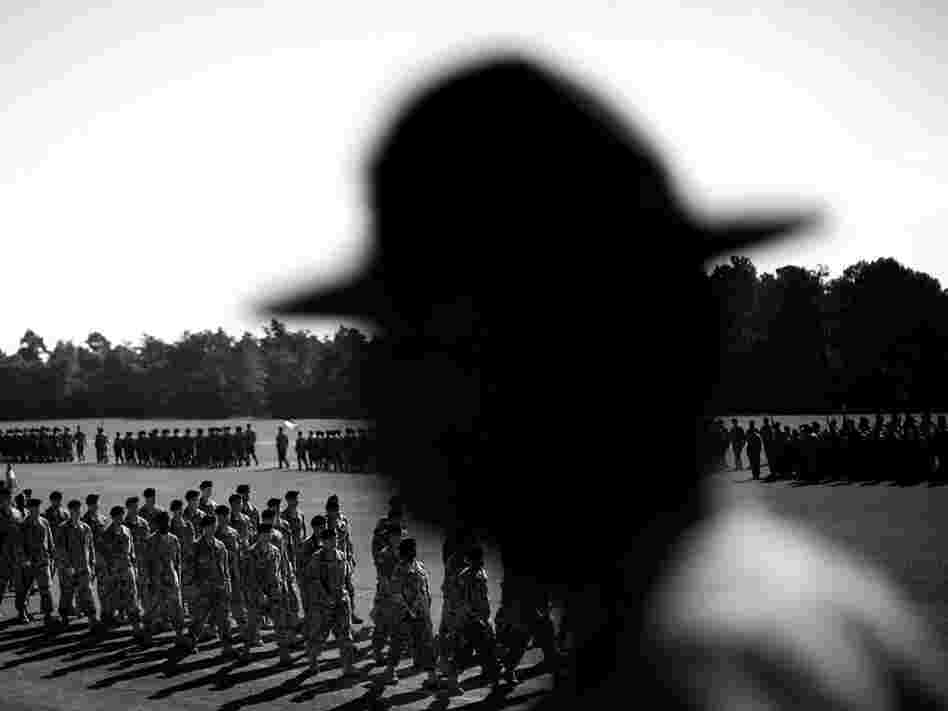 A drill seargent watches the graduation ceremony for the completion of basic training at Fort Jackson. A new report by the non-profit research organization "The Education Trust" shows that very few high school graduates have the basic math, reading or problem-solving skills necessary to enlist in the army and other branches of the military.