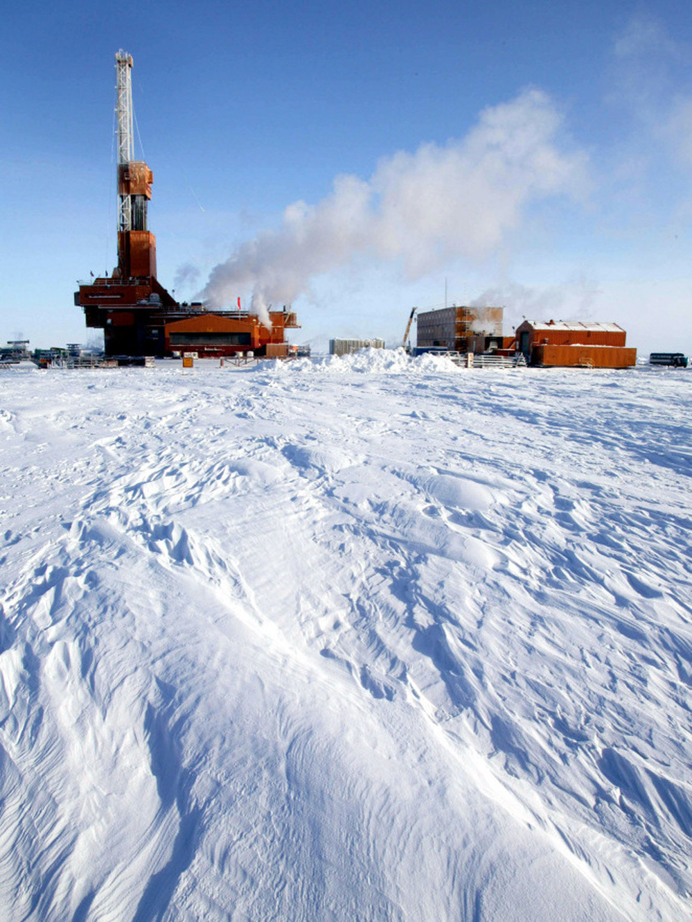 The drilling operation at the Doyon Rig 19 at the Conoco-Phillips Carbon location in the National Petroleum Reserve, Alaska, is shown in an undated file photo.