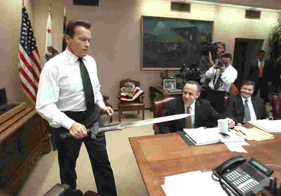 Schwarzenegger performed his job with Hollywood flair — such as when he brought the sword he used in the movie Conan the Barbarian to the conference table before the start of budget negotiations with legislative leaders in January 2009. 