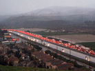 Red taillights of slow and stopped traffic glow on northbound Interstate 5 near Castaic, Calif., after heavy snow closed the major north-south several miles north of this point Sunday, Jan. 2 2011. Red taillights of slow and stopped traffic glow on northbound Interstate 5 near Castaic, Calif., after heavy snow closed the major north-south several miles north of this point Sunday, Jan. 2 2011.