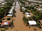 Rising floodwaters spread through the low-lying suburb of Depot Hill in Rockhampton, in eastern Queensland. Rising floodwaters spread through the low-lying suburb of Depot Hill in Rockhampton, in eastern Queensland.
