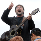 Russian rock singer Yuri Shevchuk performs at the protest rally in central Moscow on August 22, 2010.