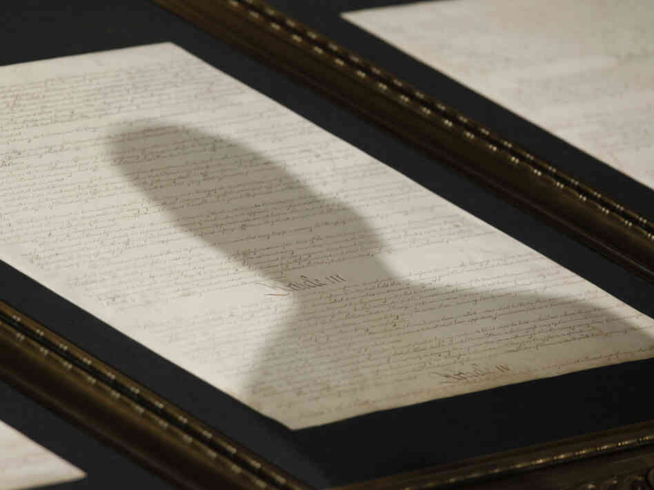 President Obama's shadow is cast on the Constitution as he delivers an speech at the National Archives in Washington in May 2009.